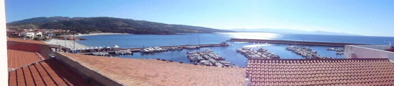 Fronte Mare Attico Indipendente Ed Esclusivo Con Terrazza Panoramica Appartement Isola Rossa Buitenkant foto