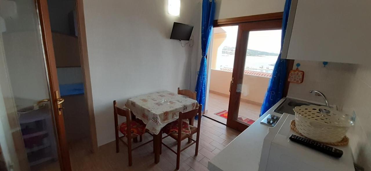 Fronte Mare Attico Indipendente Ed Esclusivo Con Terrazza Panoramica Appartement Isola Rossa Buitenkant foto