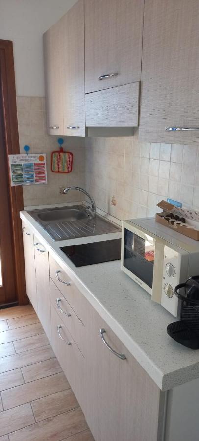 Fronte Mare Attico Indipendente Ed Esclusivo Con Terrazza Panoramica Appartement Isola Rossa Buitenkant foto